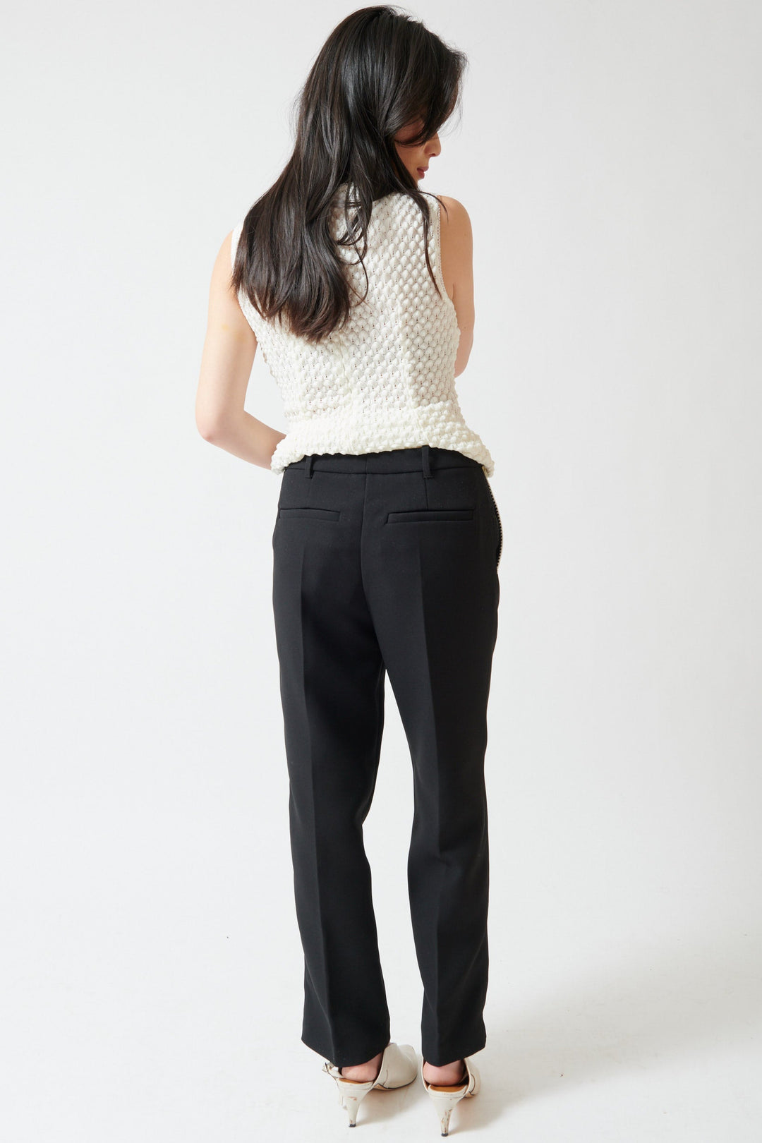 Lilly wearing Stine Goya Structured Crepe Straight Tailored Ankle Pants rear view