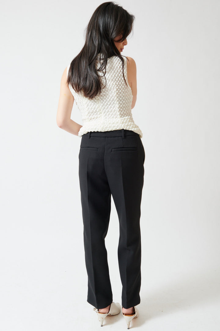 Lilly wearing Stine Goya Structured Crepe Straight Tailored Ankle Pants rear view