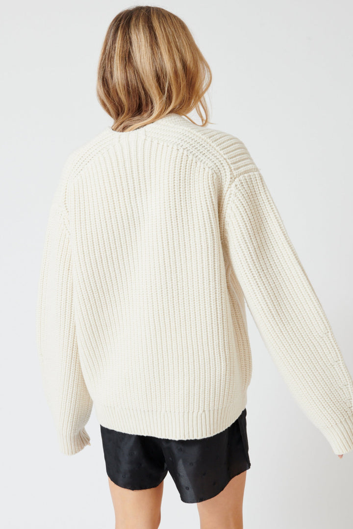 Mari wearing 6397 Fisherman Rib Cardigan rear view