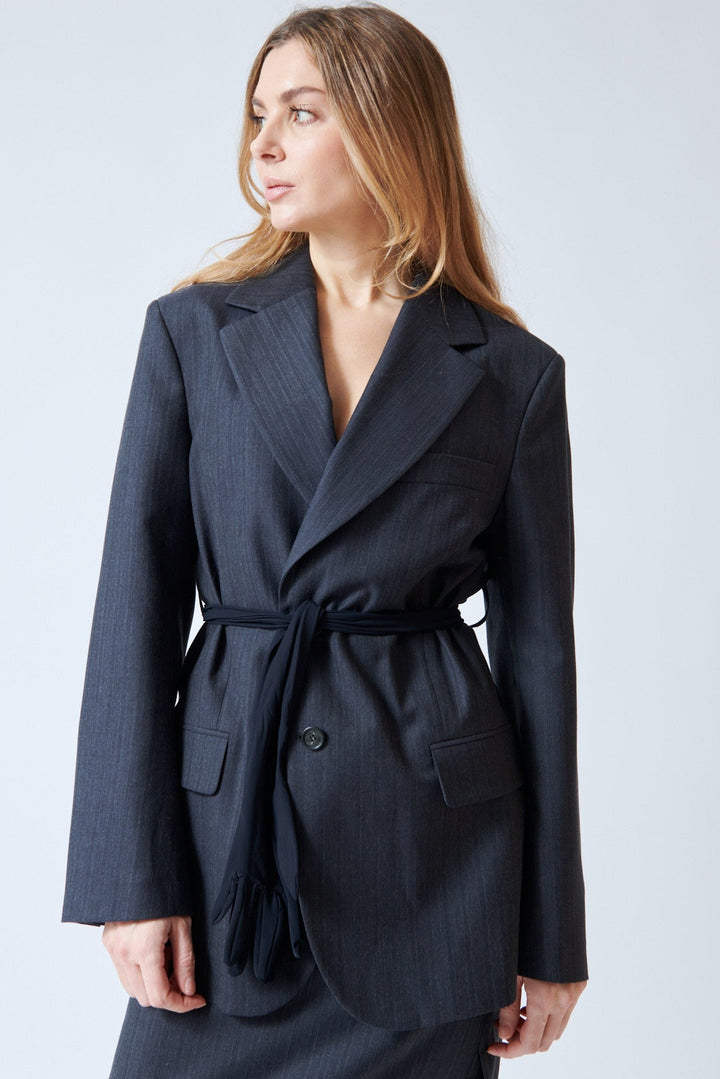 Mari wearing MM6 Maison Margiela No Glove No Love Jacket front view