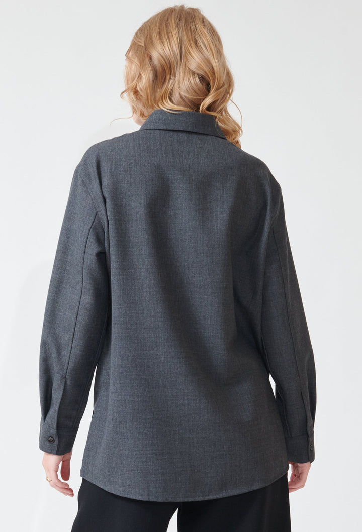 Madi wearing Studio Nicolson Pinole Half Placket Shirt rear view