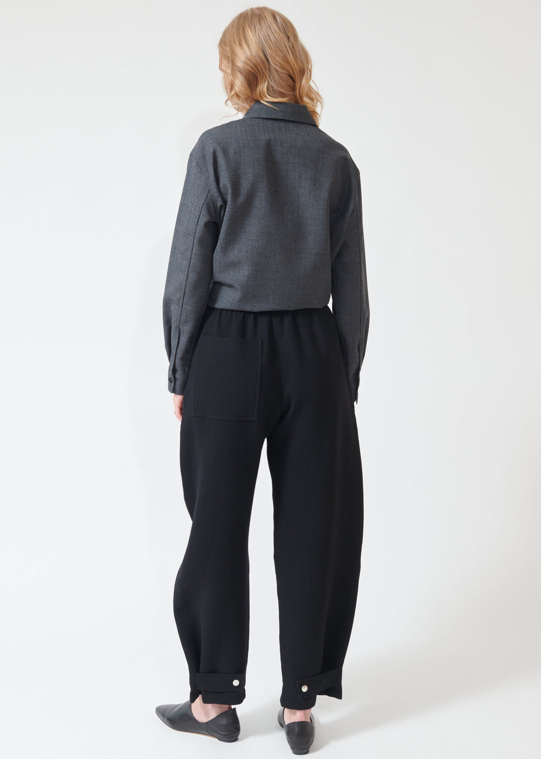 Madi wearing Studio Nicolson Thalo Elastic Waist Pant rear view