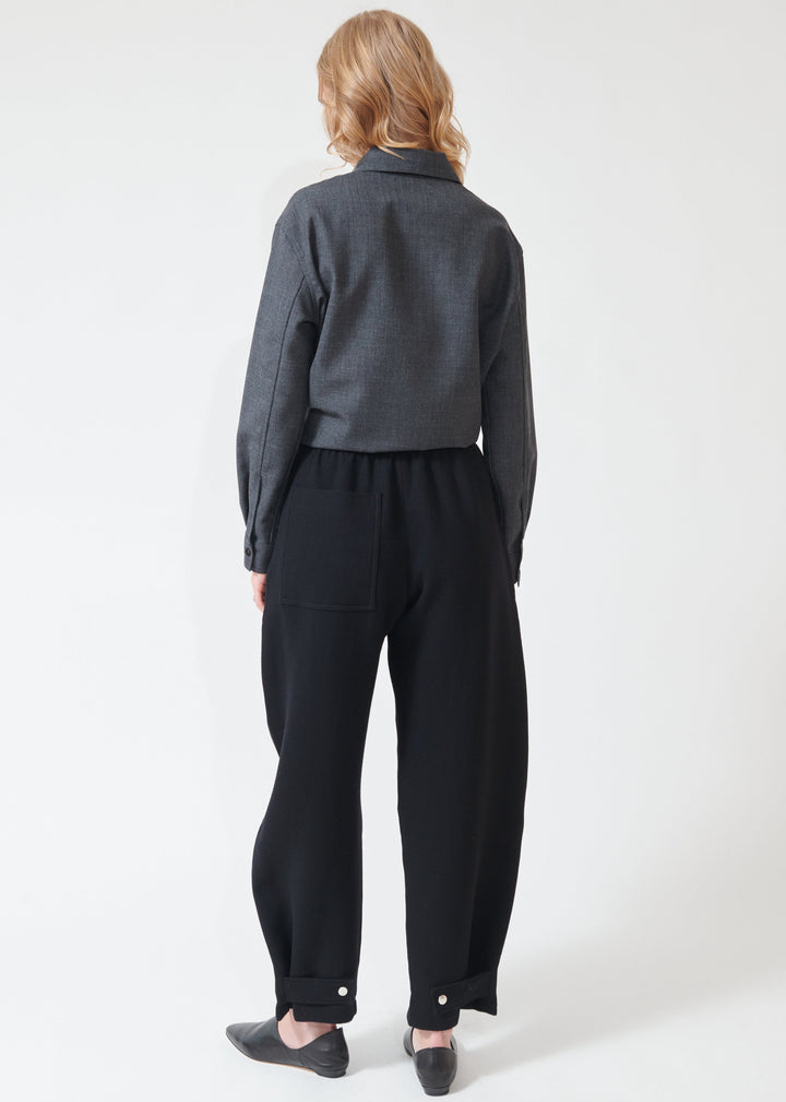 Madi wearing Studio Nicolson Thalo Elastic Waist Pant rear view