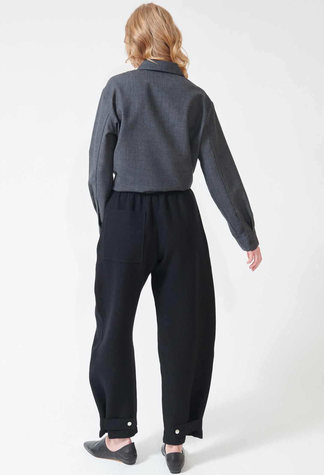 Madi wearing Studio Nicolson Thalo Elastic Waist Pant rear view