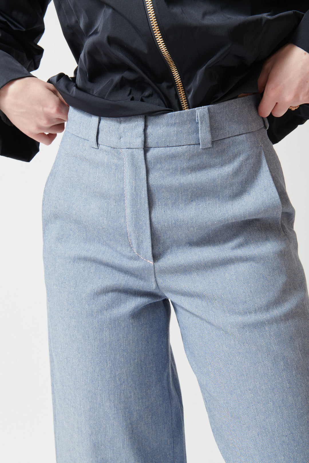 Madi wearing Odeeh Serge Pant front/detail view 