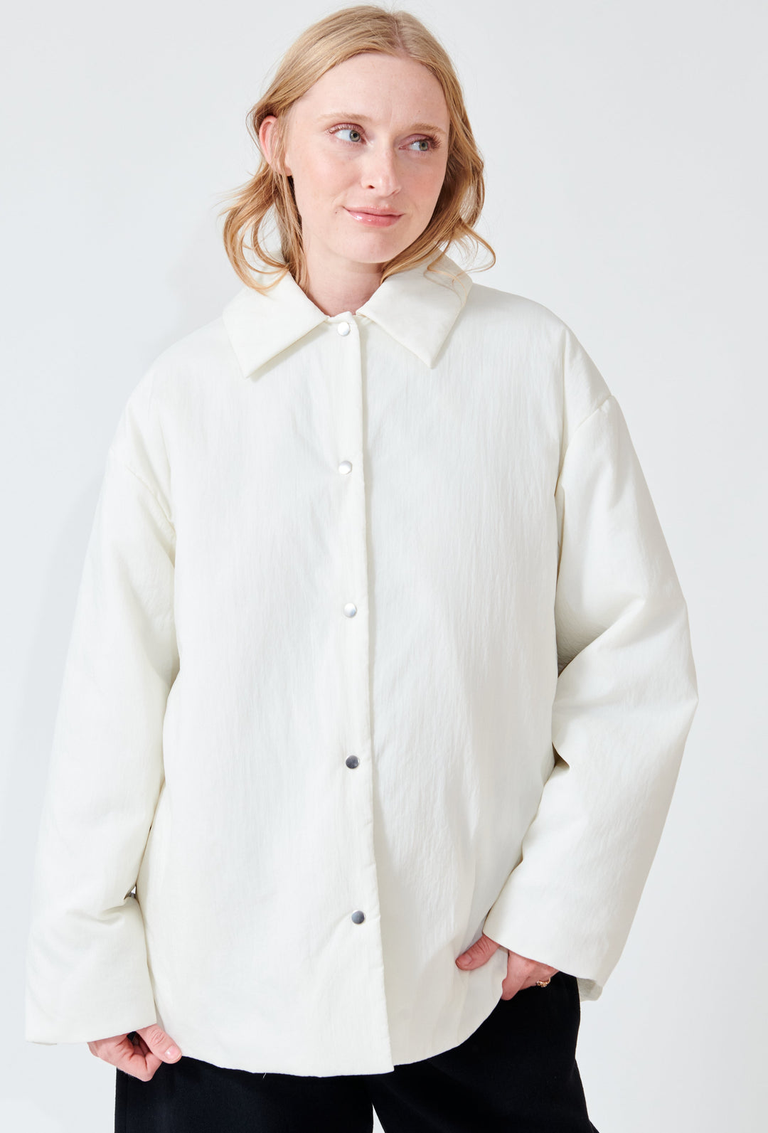 Madi weairng Studio Nicolson Togg Padded Overshirt Jacket front view