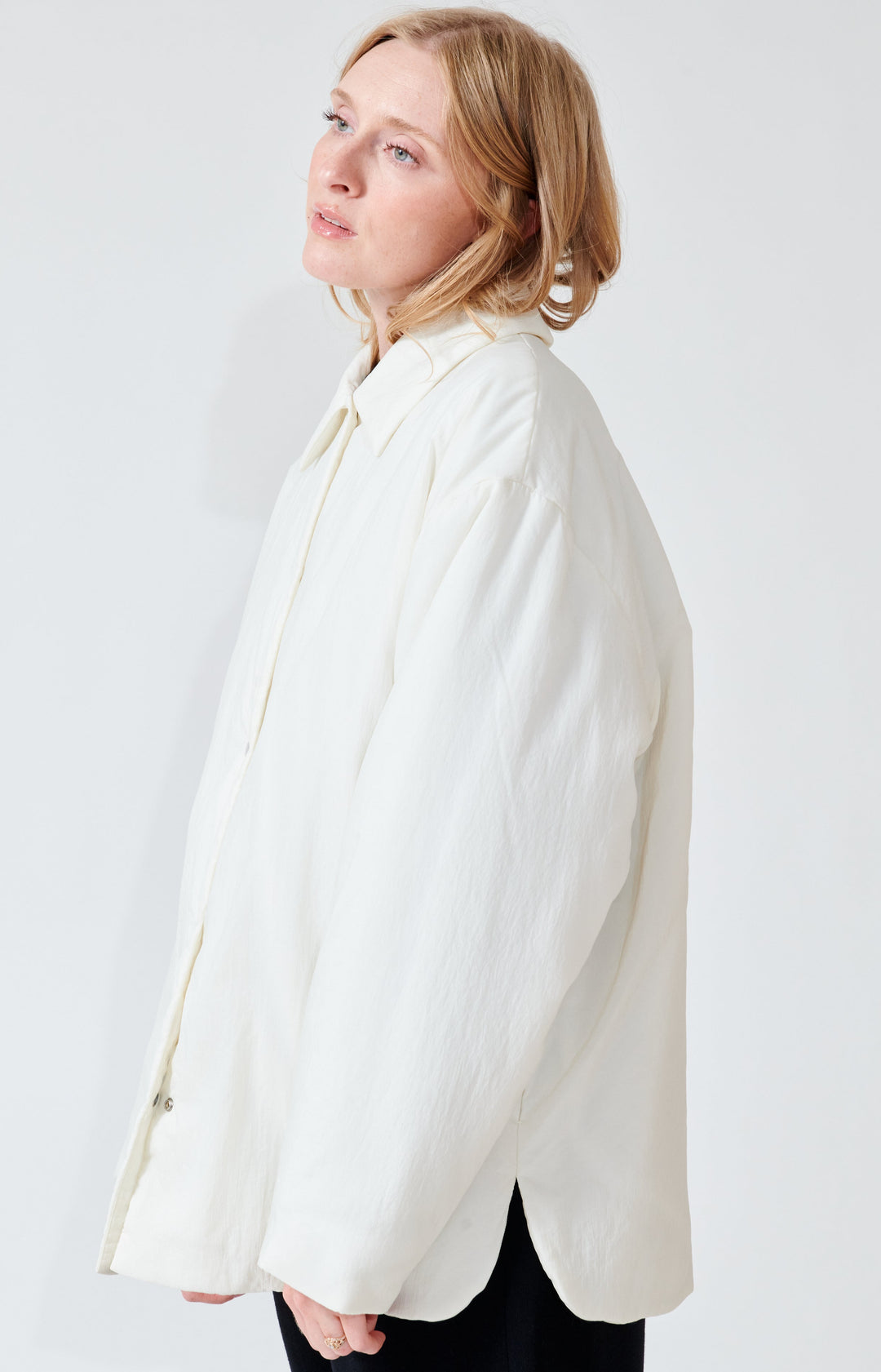 Madi weairng Studio Nicolson Togg Padded Overshirt Jacket side view