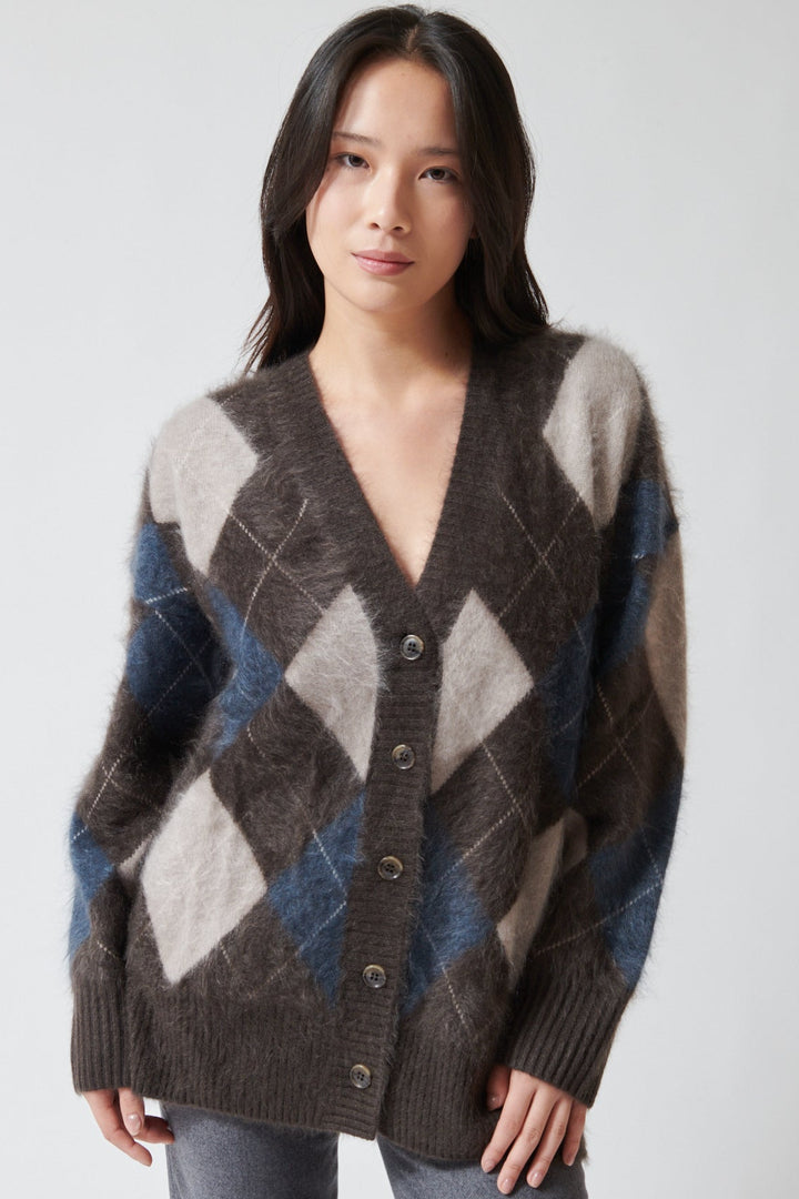 Lilly wearing Lisa Yang Elaria Cardigan front view