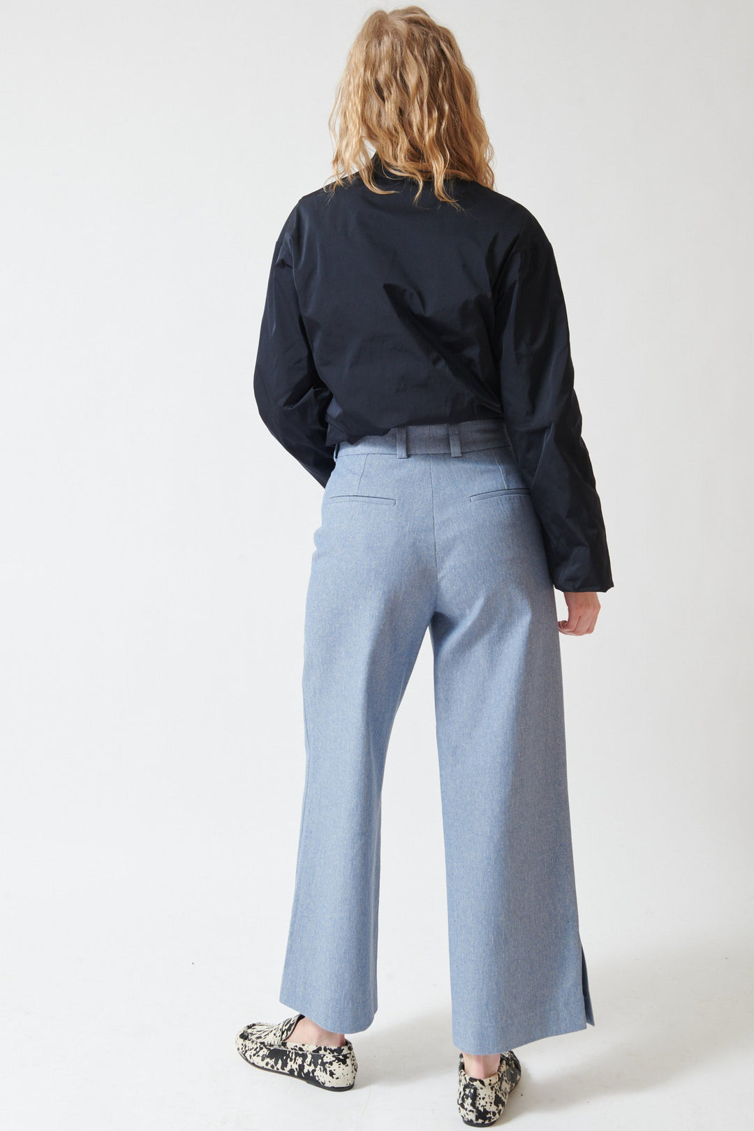 Madi wearing Odeeh Serge Pant rear view 