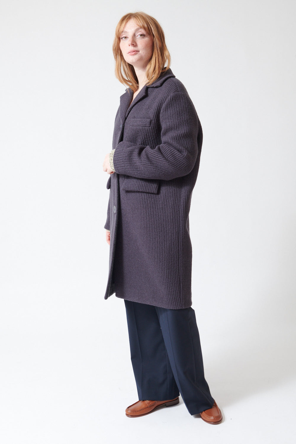 Waverly wearing Tela Soul Coat side view