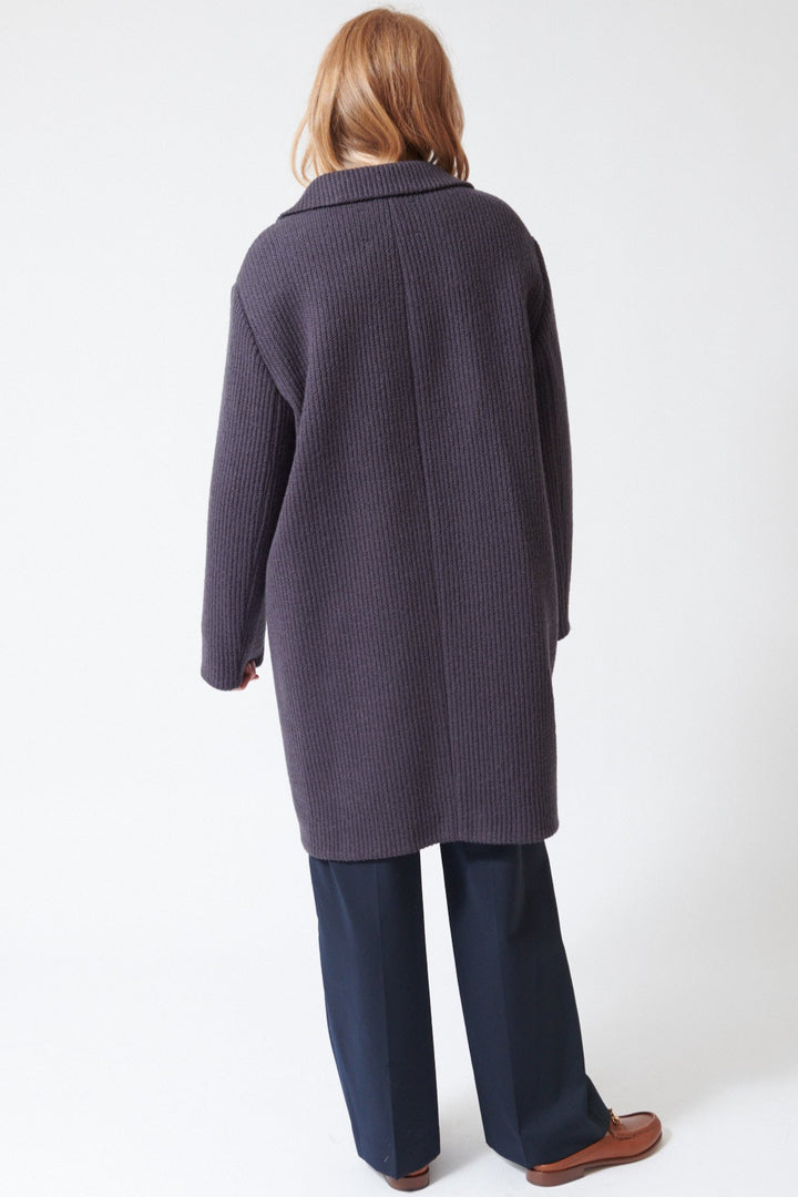 Waverly wearing Tela Soul Coat rear view
