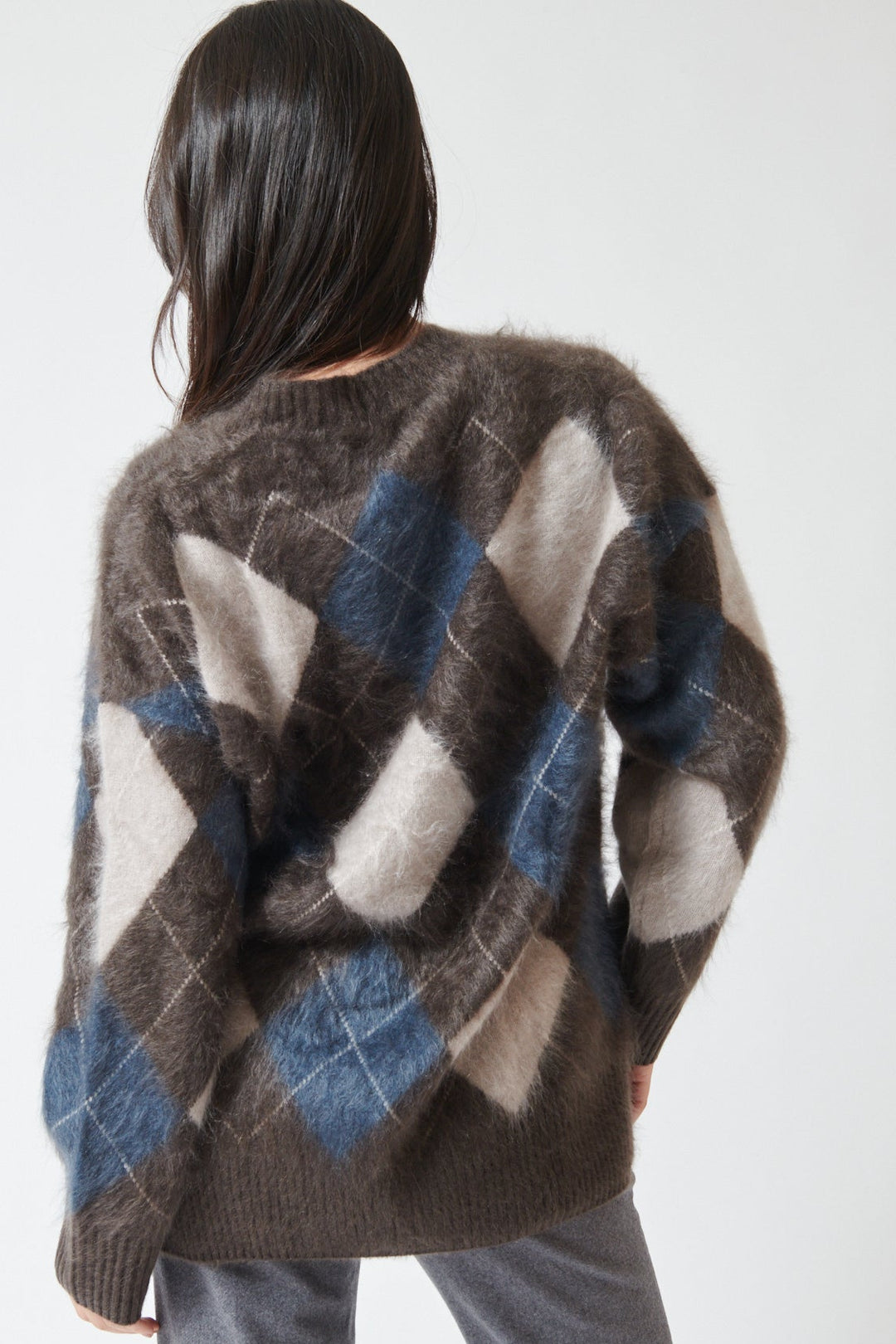 Lilly wearing Lisa Yang Elaria Cardigan rear view