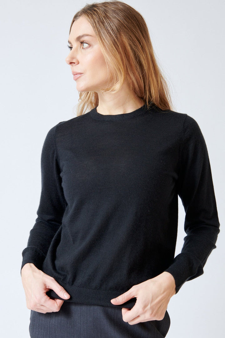 Mari wearing Allude Cashmere Long Sleeve Core Sweater front view
