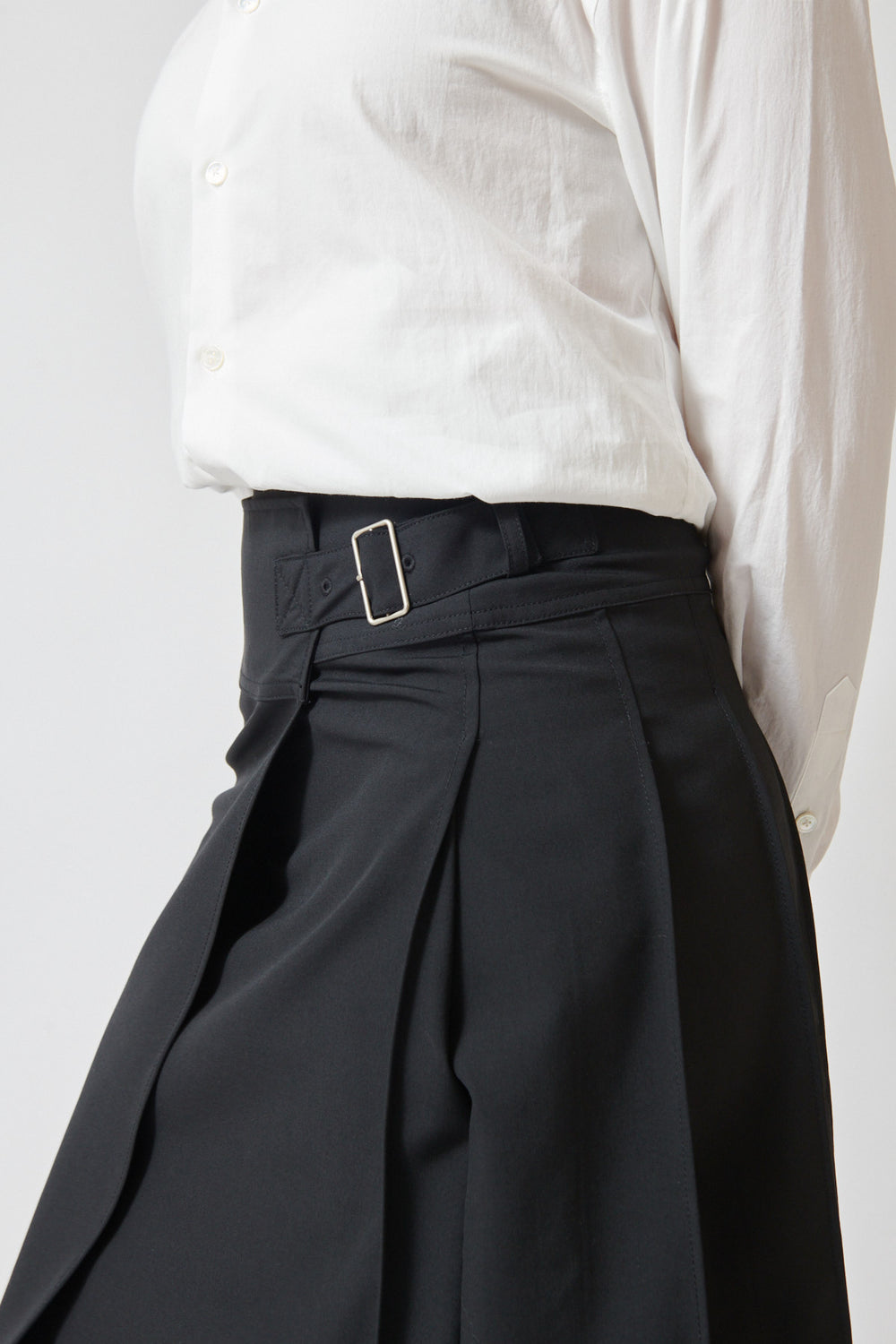 Waverly wearing 6397 Pleated Wrap Skirt Jet front/side view