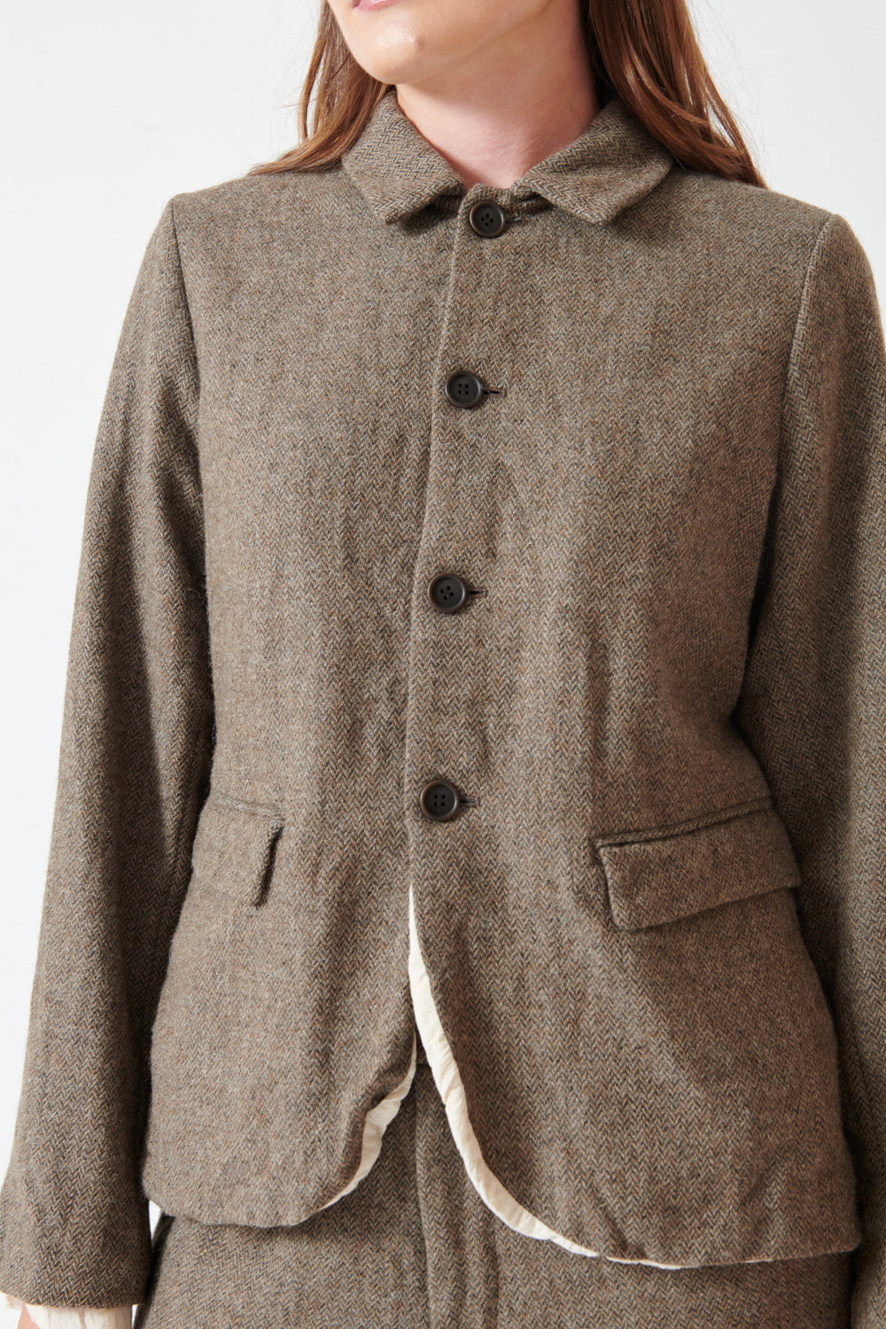 Julia wearing Eco Wool Herringbone Short Jacket Beige front view
