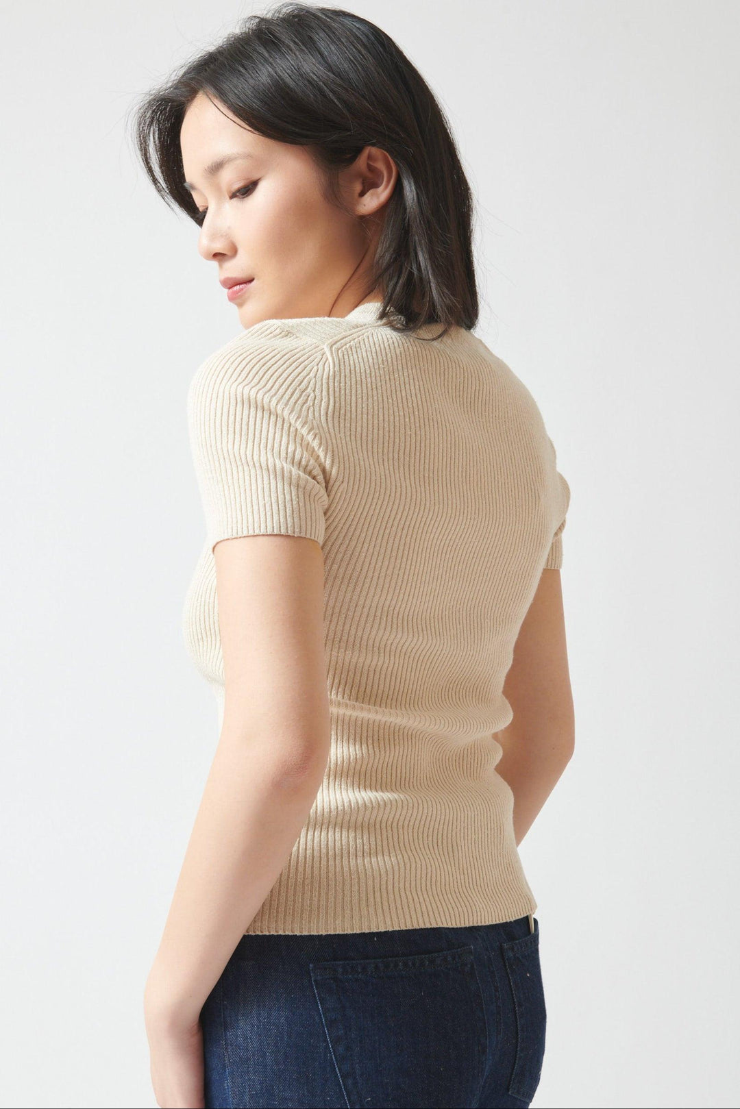 Lilly wearing Nili Lotan Italia Sweater rear view
