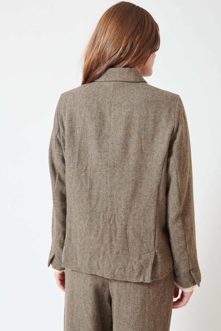 Julia wearing Eco Wool Herringbone Short Jacket Beige rear view
