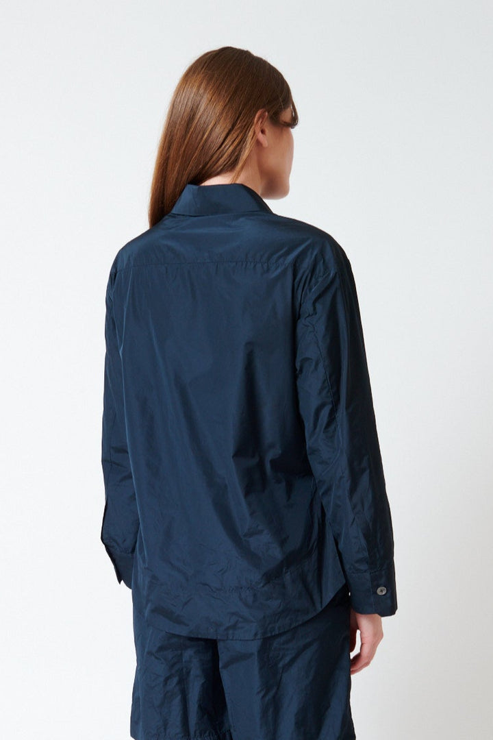 Julia wearing Odeeh Ultra Light Taffeta Shirt rear view