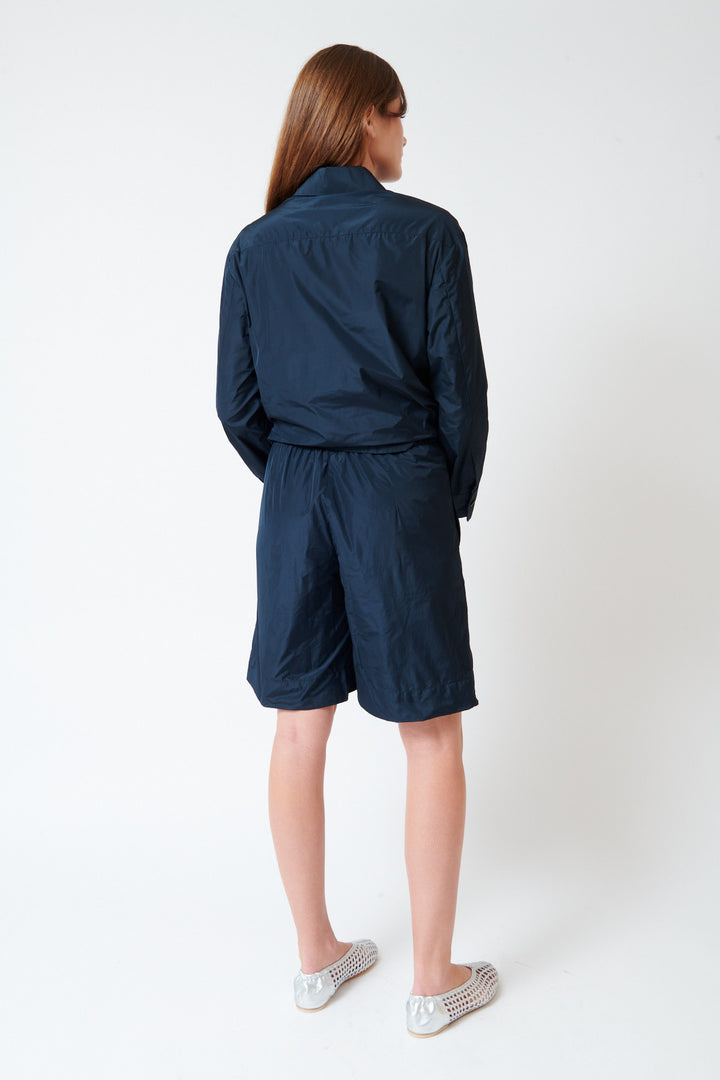 Julia wearing Odeeh Ultra Light Taffeta Shorts rear view