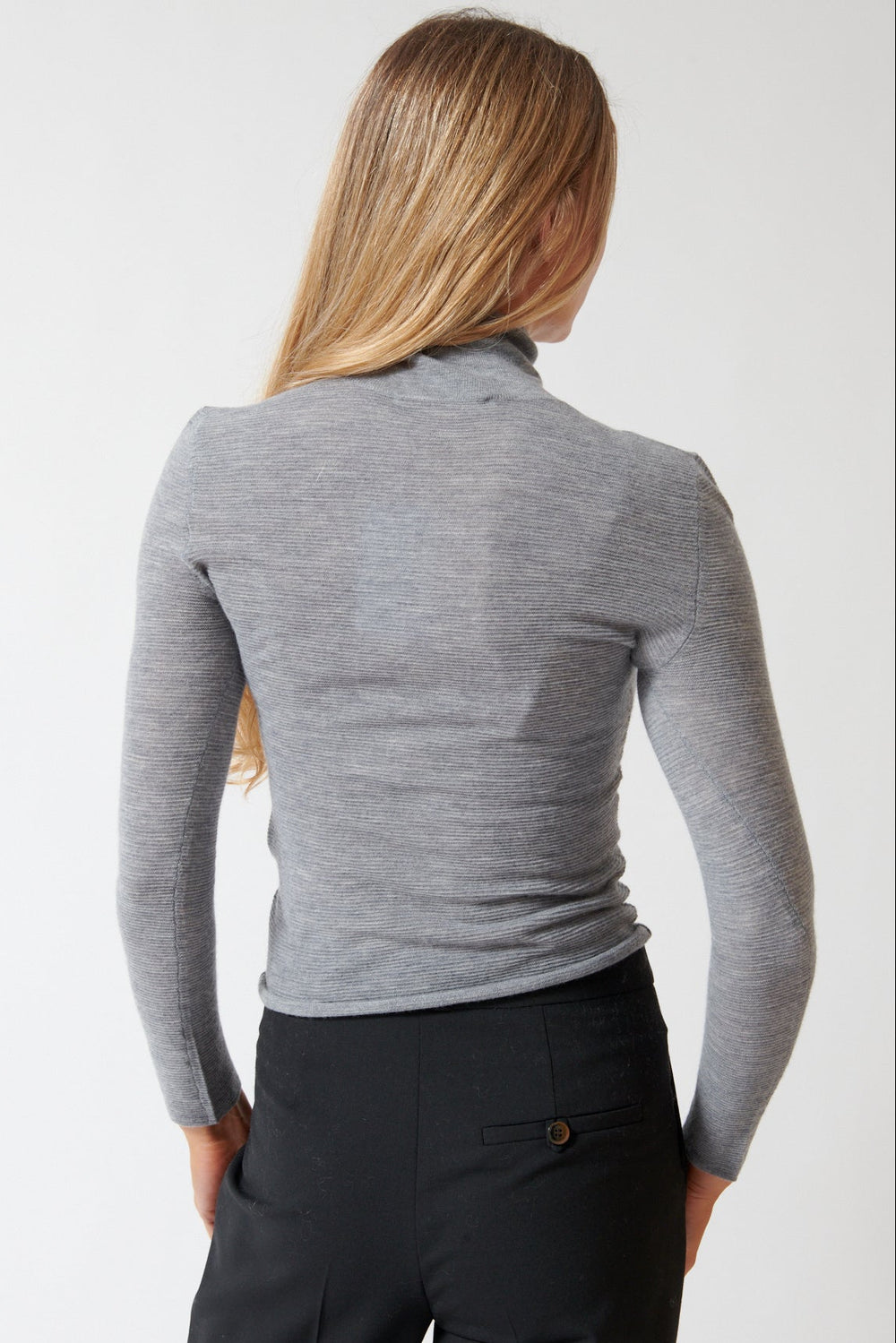 Mari wearing Lisa Yang Lory Sweater rear view