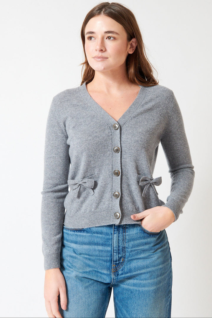 Julia wearing Jumper 1234 Bow Pocket Cardigan front view