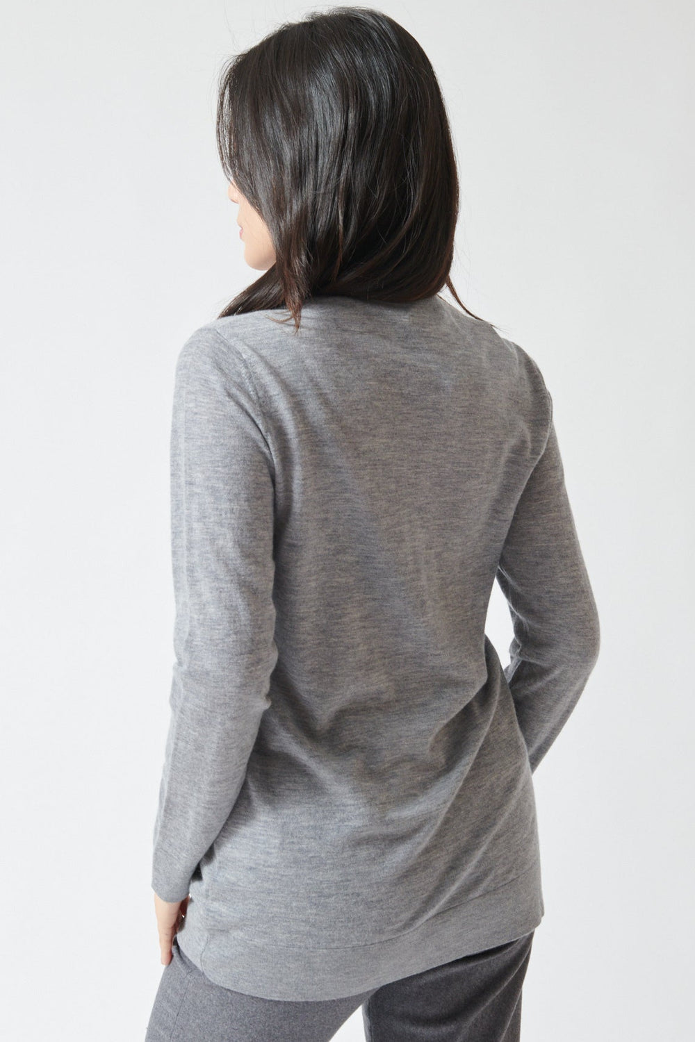 Lilly wearing Lisa Yang Adeline Cardigan rear view