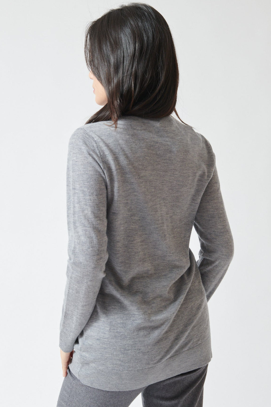 Lilly wearing Lisa Yang Adeline Cardigan rear view