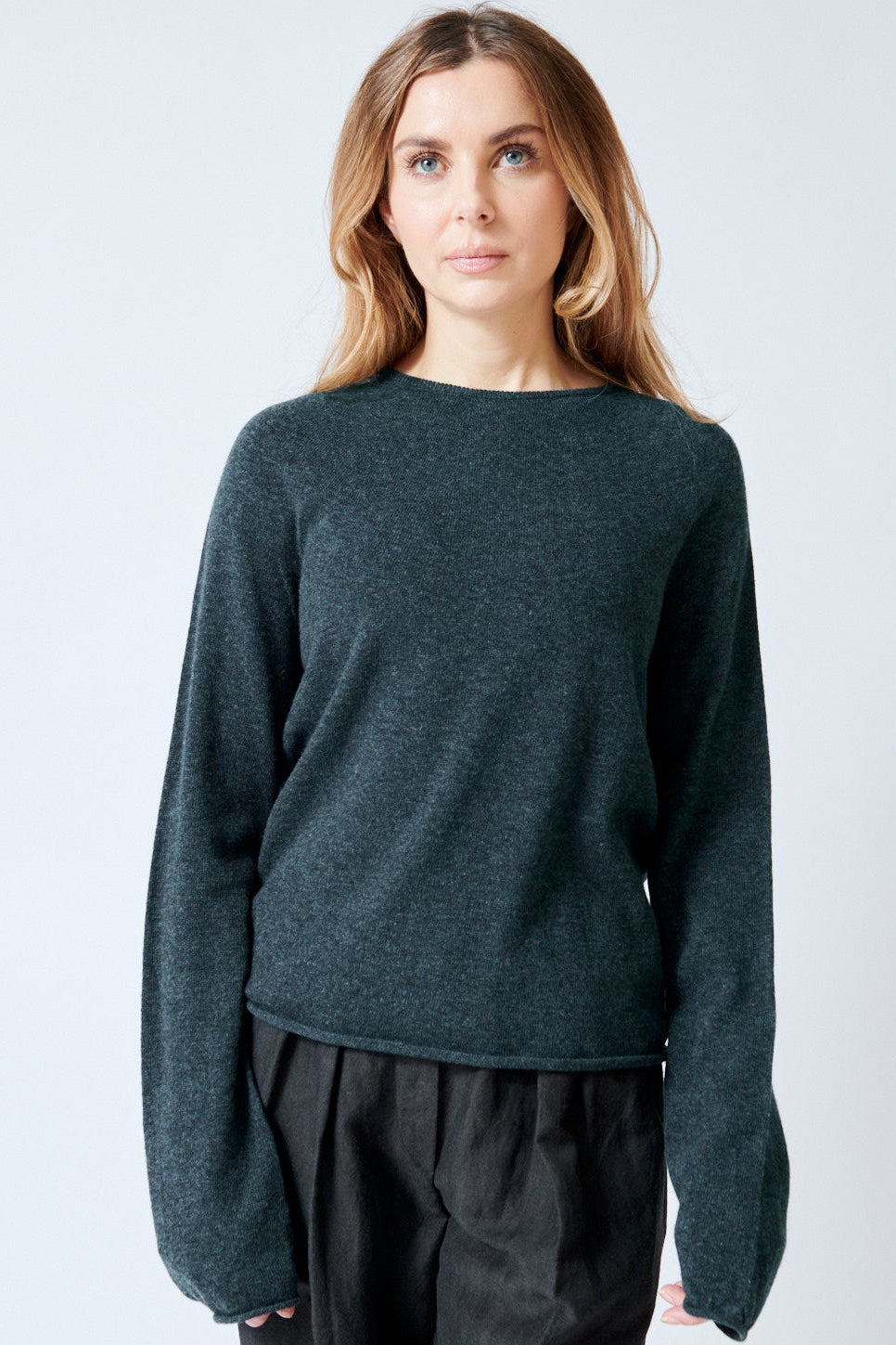 Mari wearing Christian Wijnants Kipli Seamless Round Neck Sweater front view