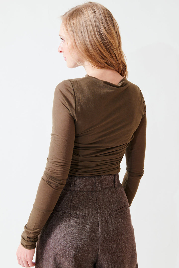 Madi wearing Soeur Gaia Top rear view