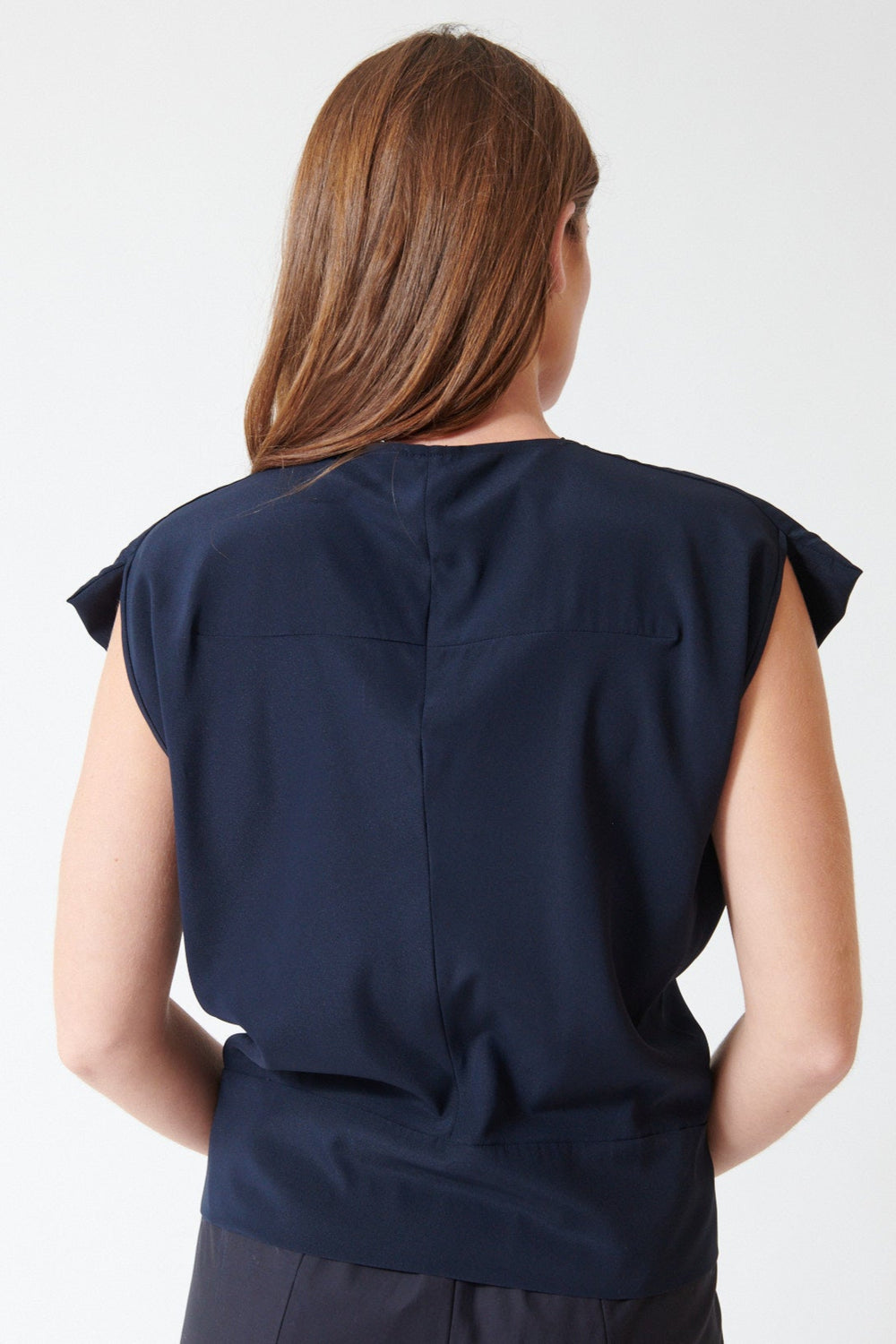 Julia wearing Zero + Maria Cornejo Silk Charmeuse Wrap Mido Top in Ink Jet, rear view
