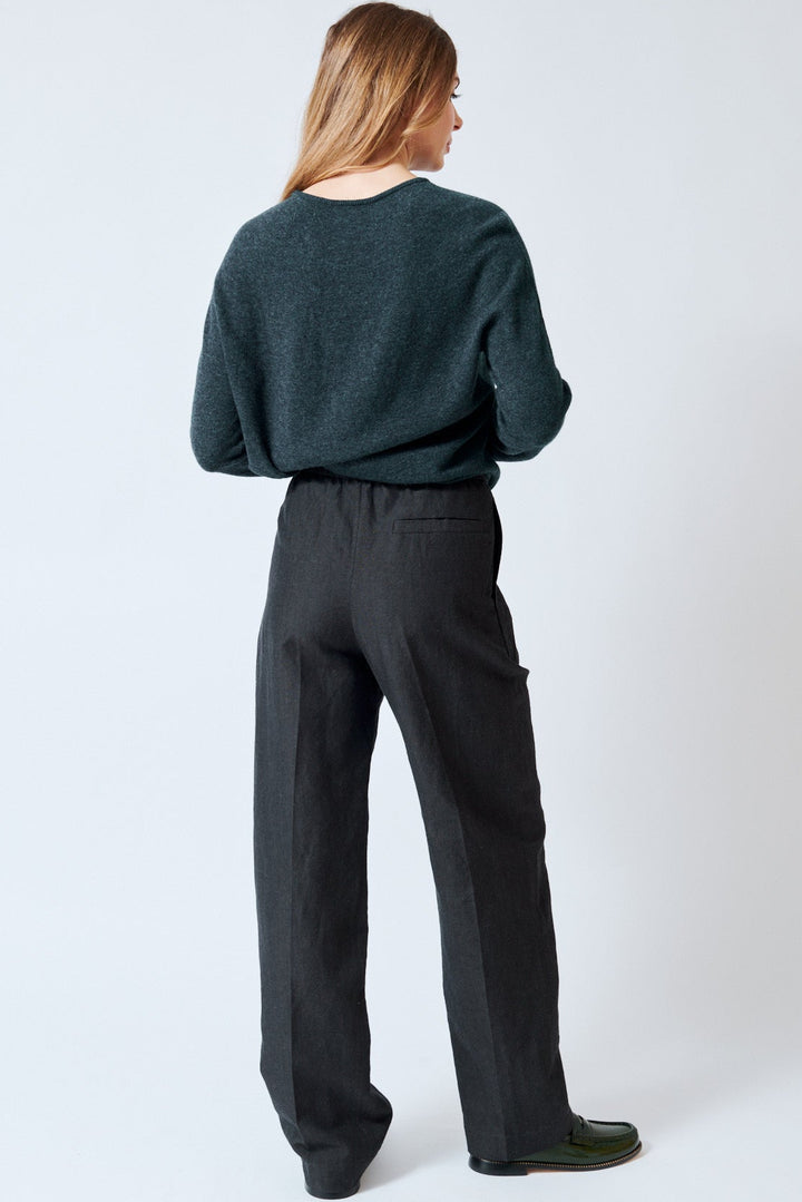 Mari wearing Christian Wijnants Piga Relaxed Fit Tapered Elastic Waist Pants rear view