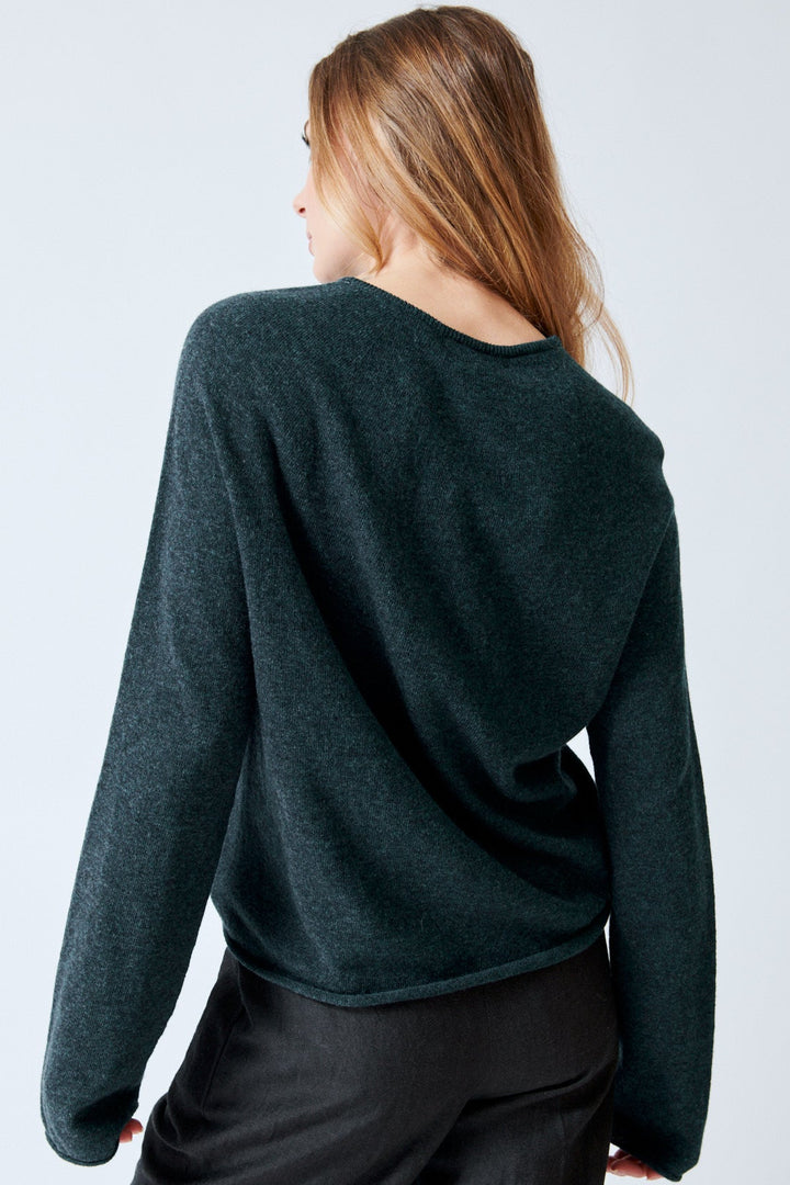 Mari wearing Christian Wijnants Kipli Seamless Round Neck Sweater rear view