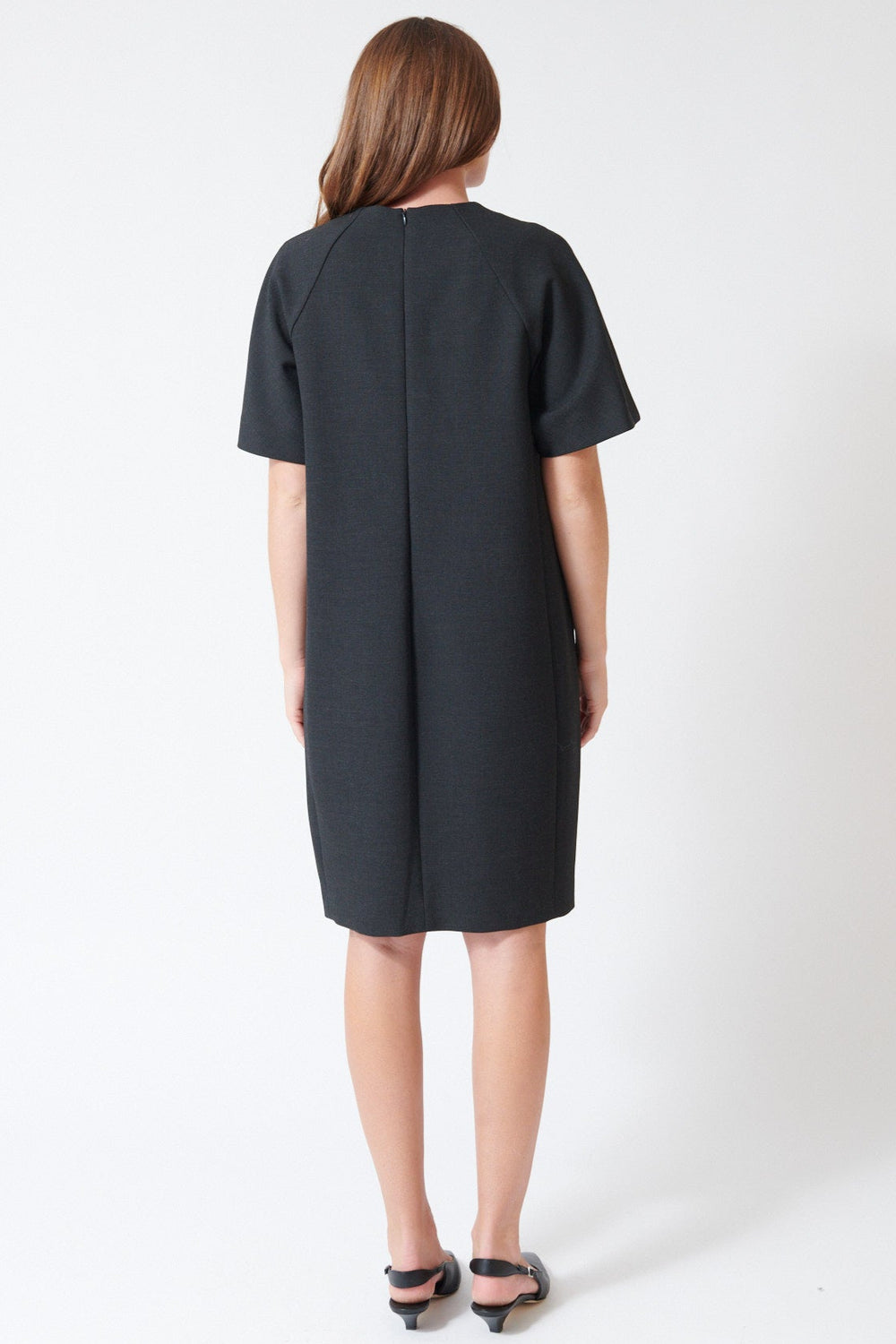 Julia in Peserico Bistretch Compact Double Technical Canvas Midi Dress, rear view.