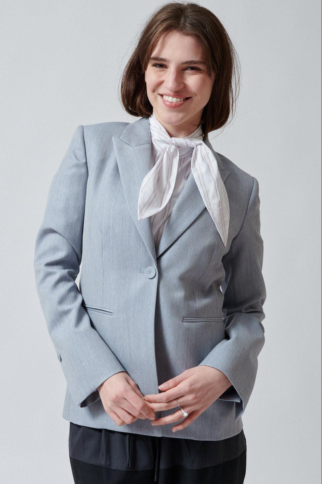 Sophie wearing TWP Her Fit Blazer Update front view