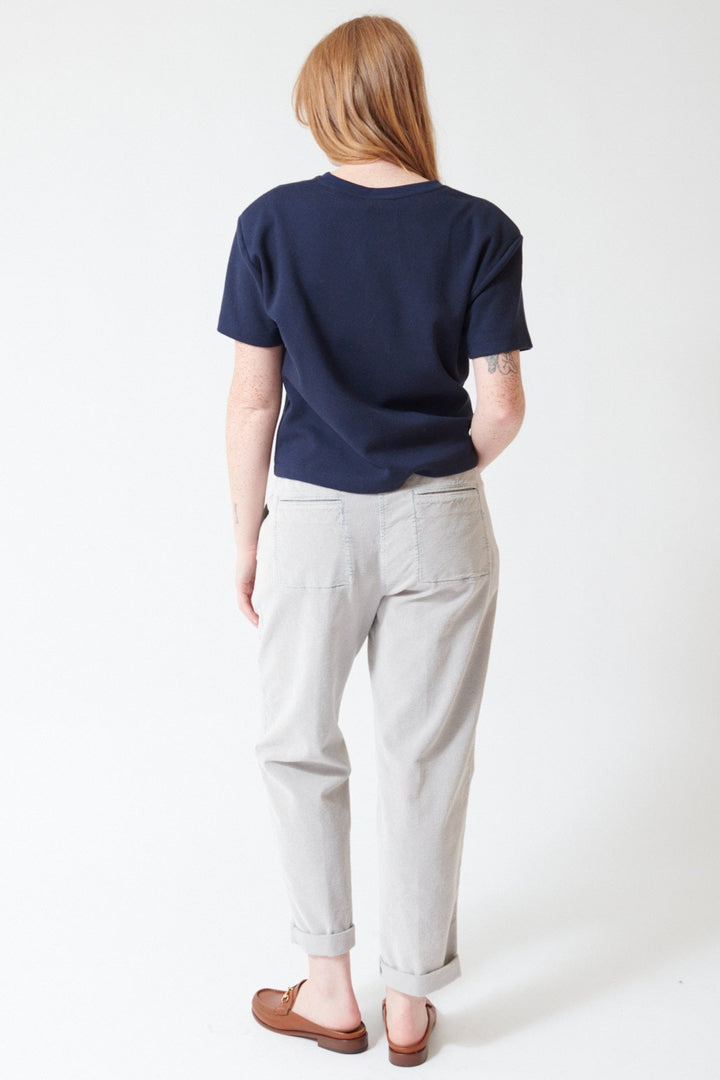 Waverly wearing Peserico Stretch Cotton Ready To Dye Corduroy Pants in Stone Grey, rear view.