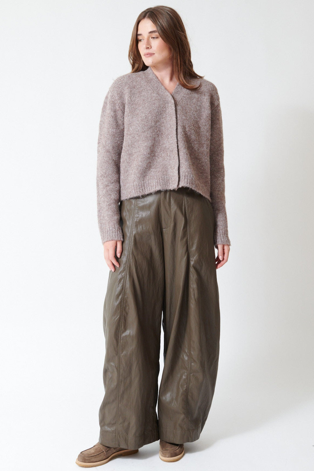 Julia wearing ELEH Wide Leg Leather Look Trouser in Dark Taupe, front view.
