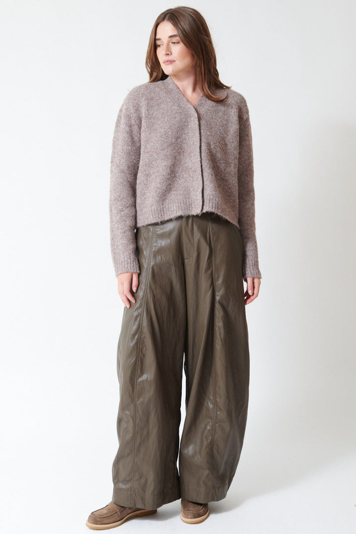 Julia wearing ELEH Wide Leg Leather Look Trouser in Dark Taupe, front view.