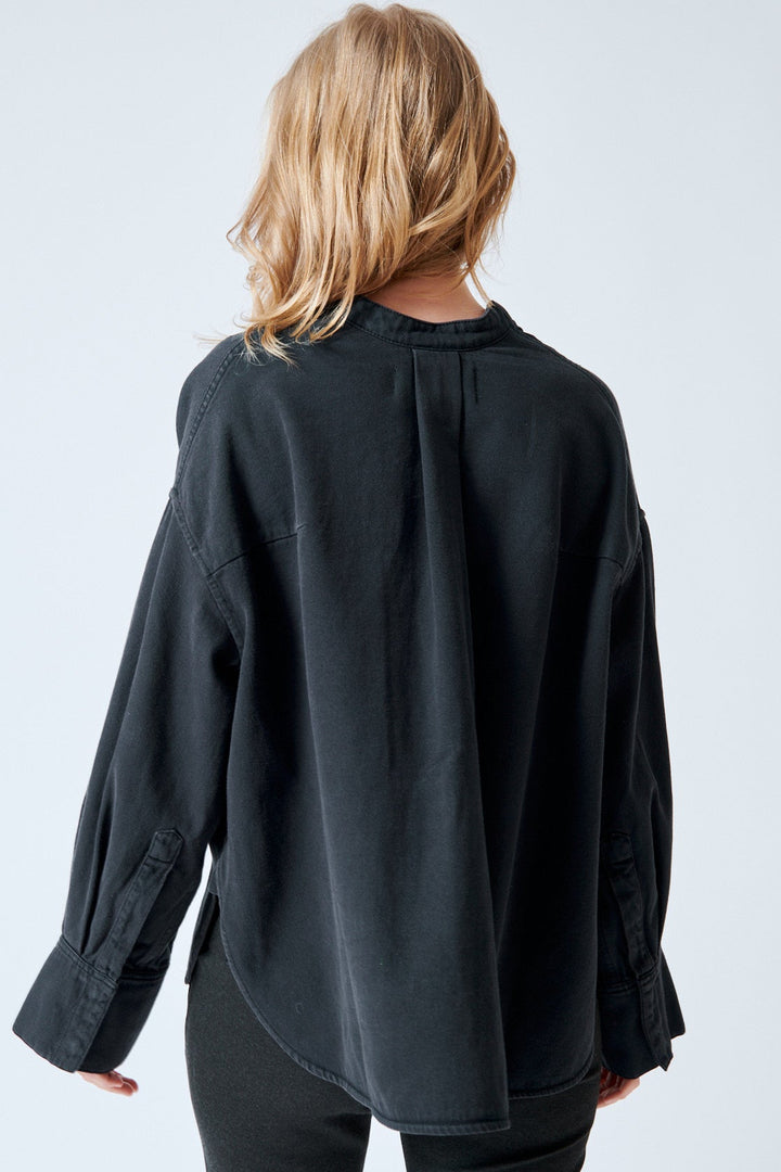 Madi wearing Christian Wijnants Tarosa Oversized Denim Shirt rear view