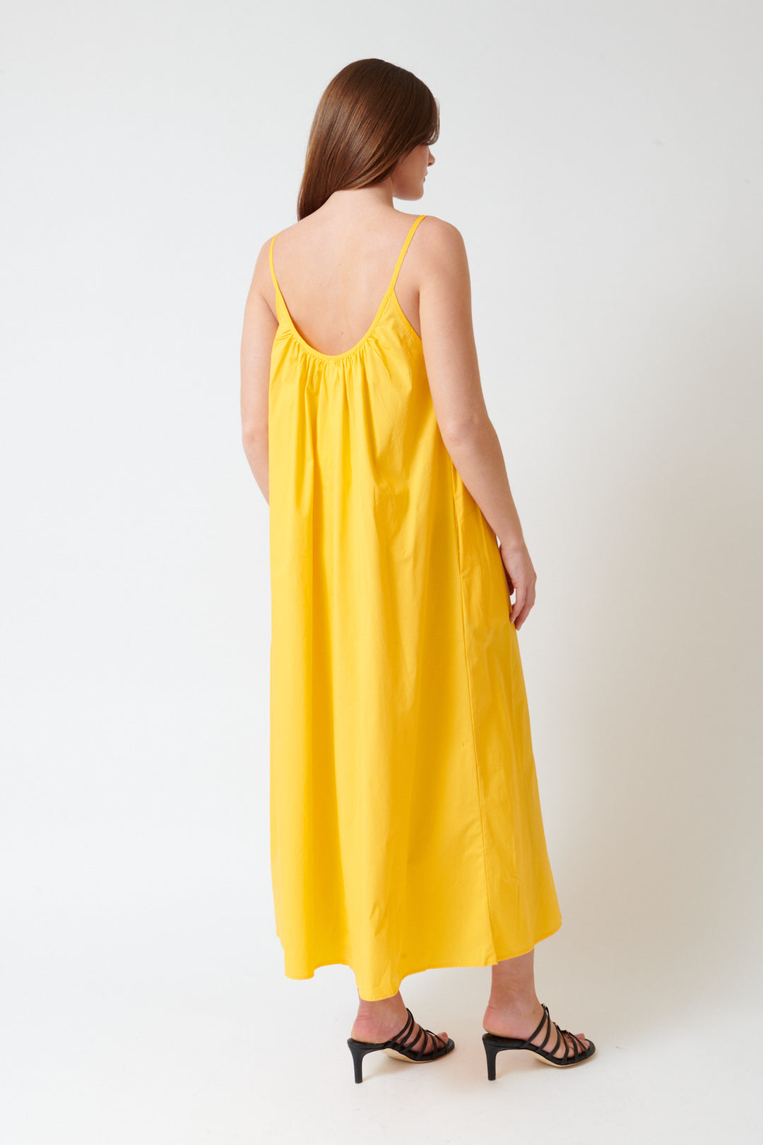 Julia wearing Kowtow T Sunset Dress rear view