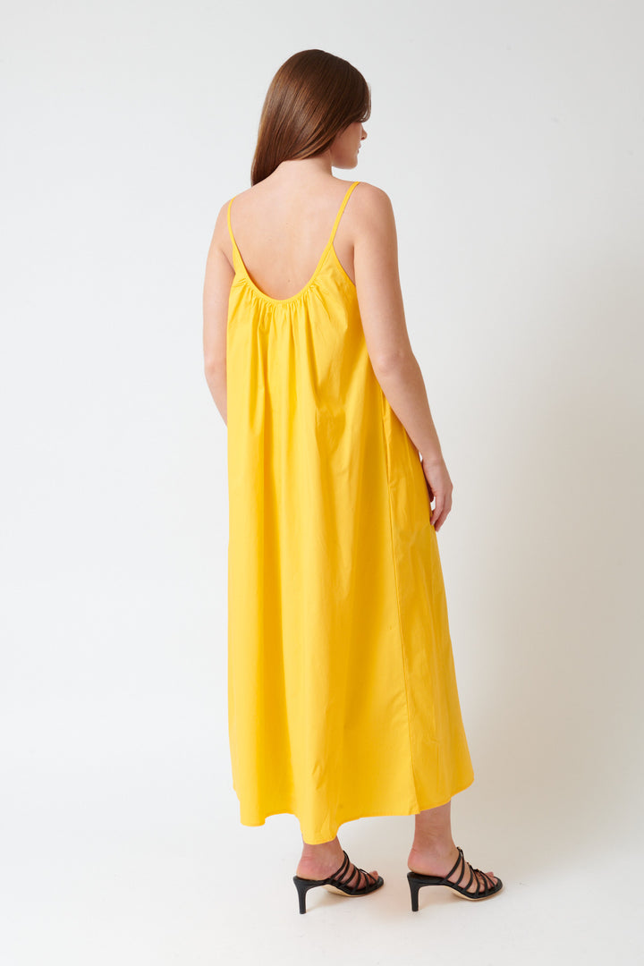 Julia wearing Kowtow T Sunset Dress rear view