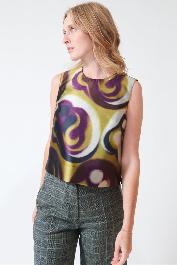 Madi wearing Odeeh Shiny Serge Blurred Paisley Shell Top front view