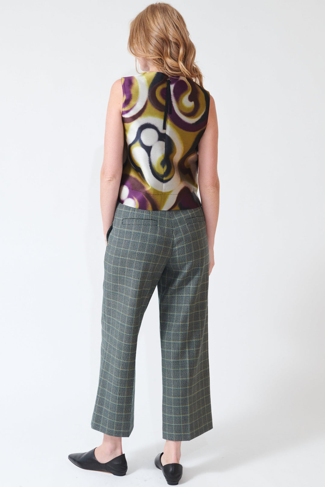 Madi wearing Odeeh Fancy Check Pants rear view