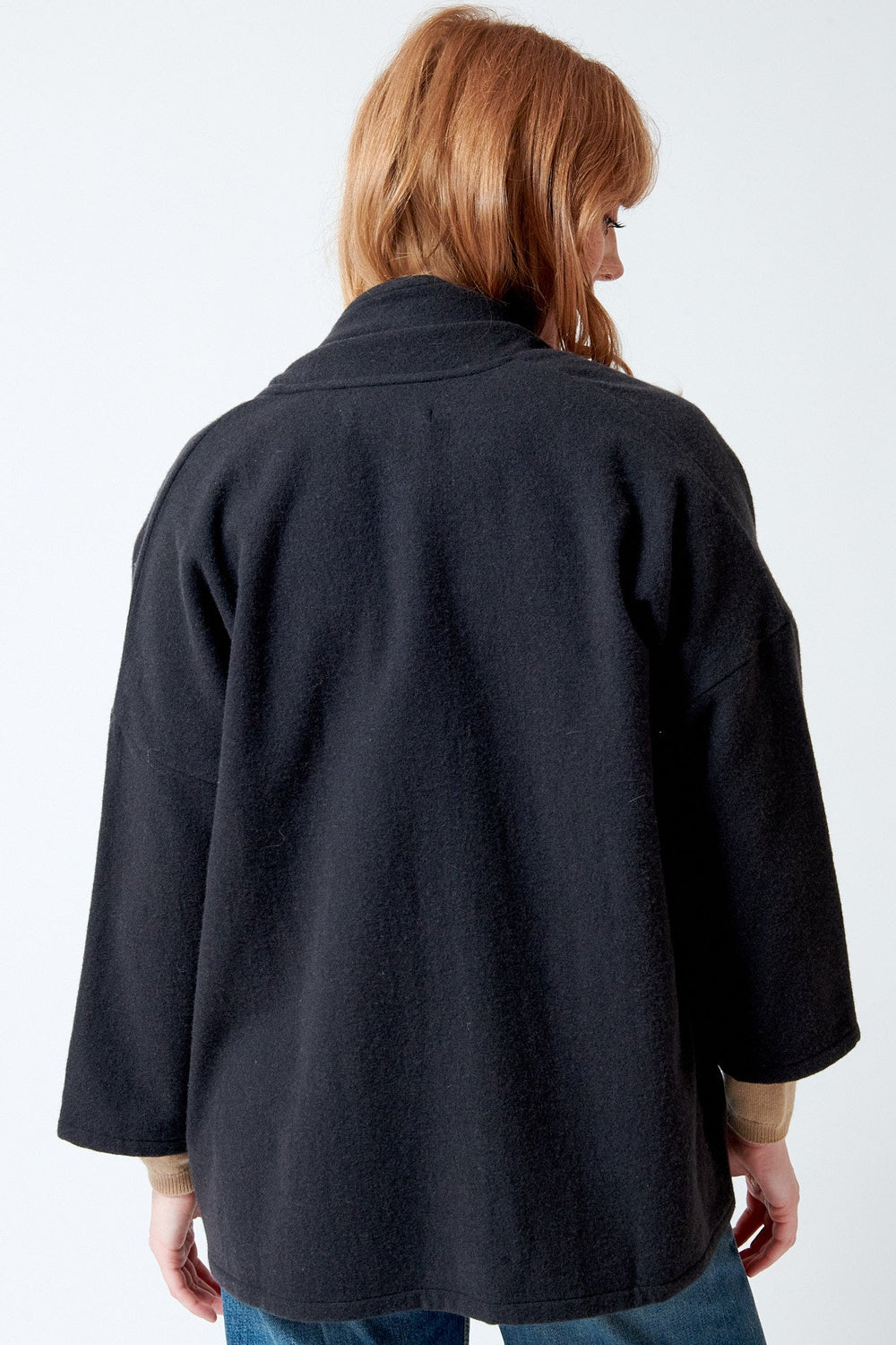 Waverly wearing Evam Eva Short Robe rear view