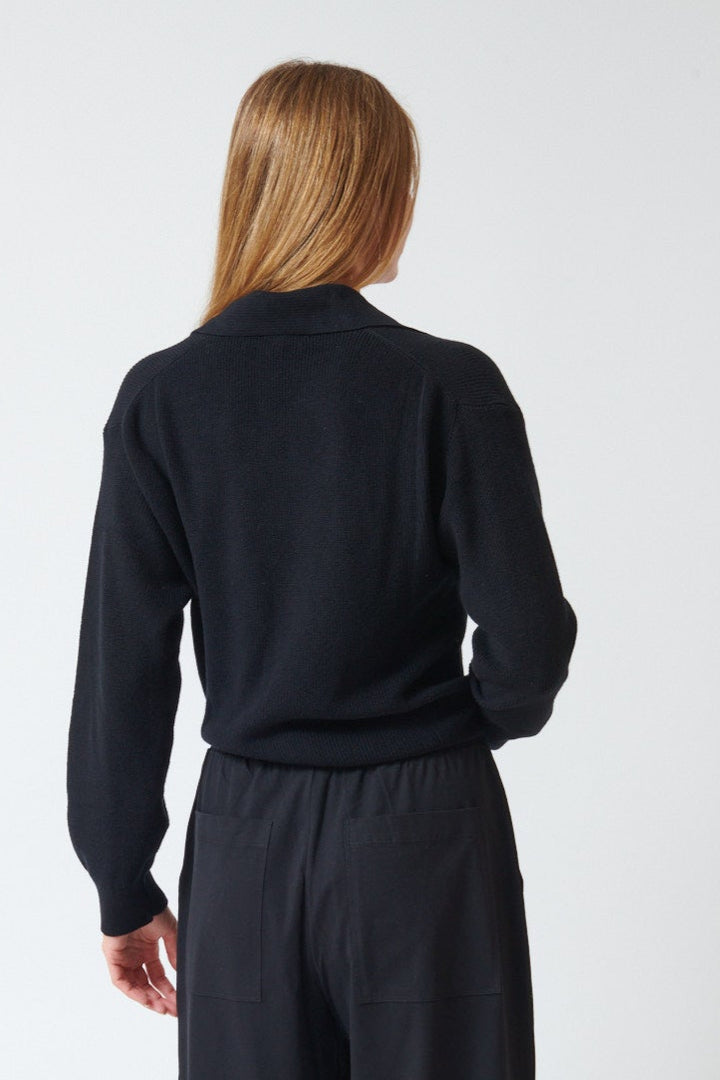 Mari wearing Kowtow Merel Cardigan rear view