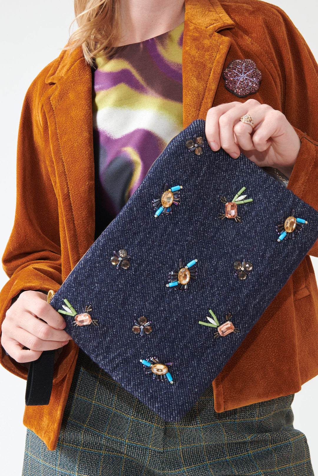 Madi wearing Odeeh Embellished Heavy Wool Denim Wristlet front view