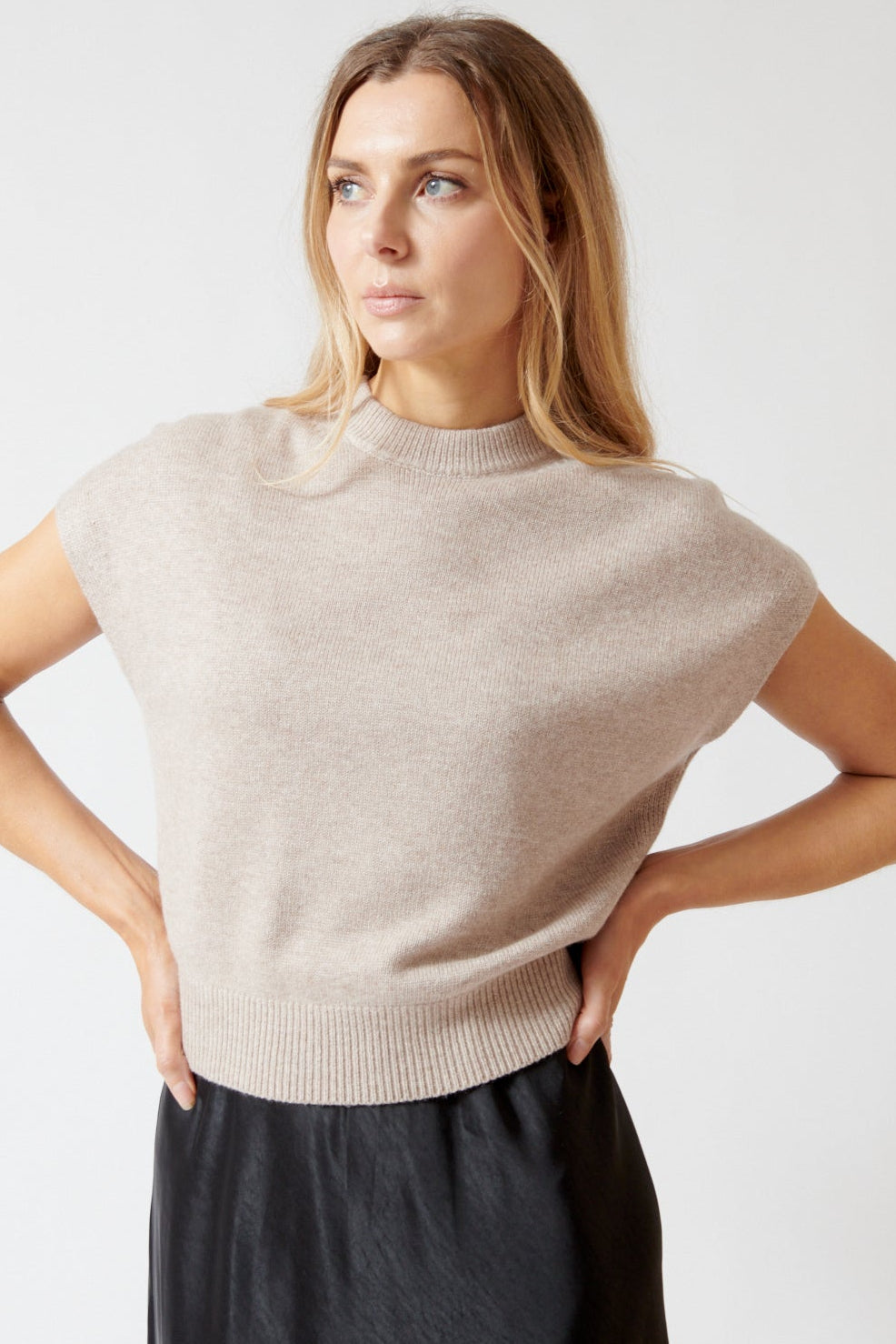 Mari wearing Lilla P Banded Bottom Wedge Sweater front view