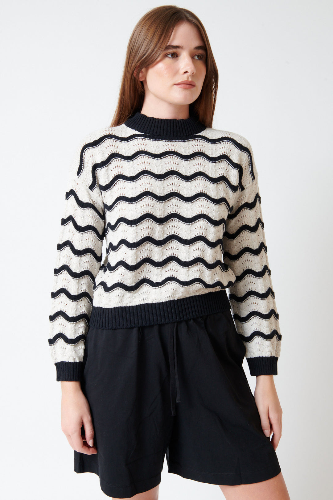 Julia wearing Kowtow Tide Jumper front view