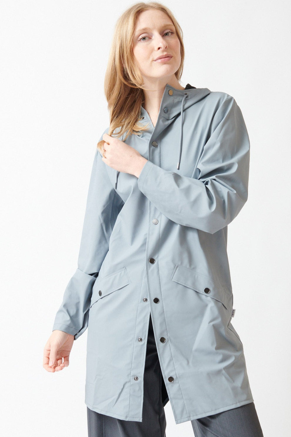 Madi wearing Rains Long Jacket W3 front view