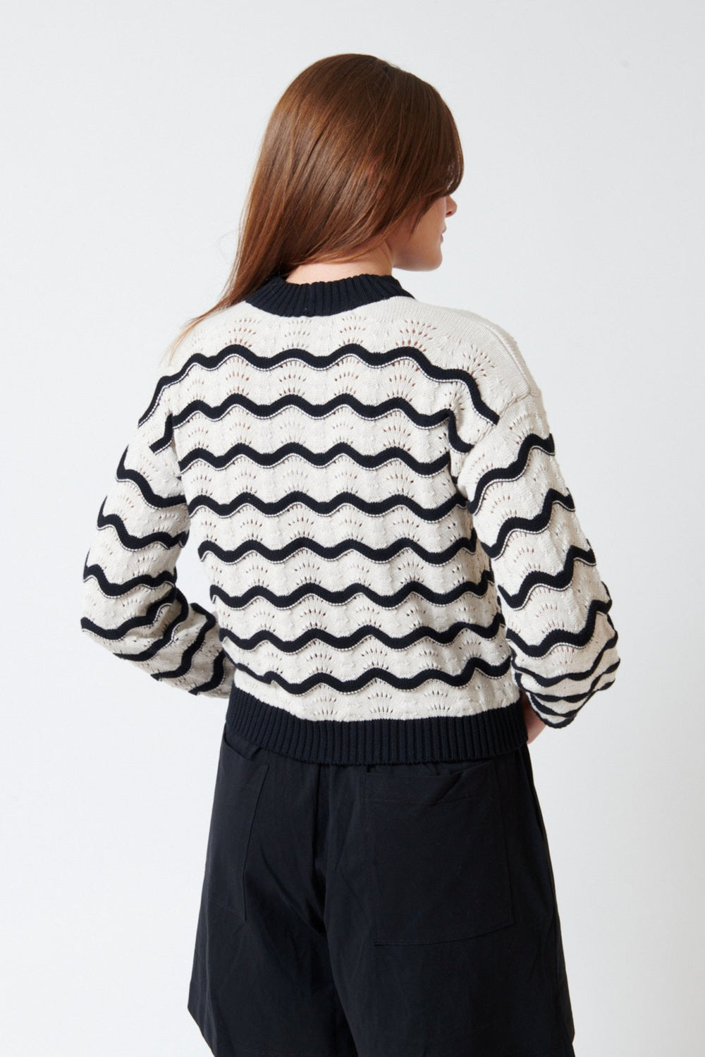 Julia wearing Kowtow Tide Jumper rear view