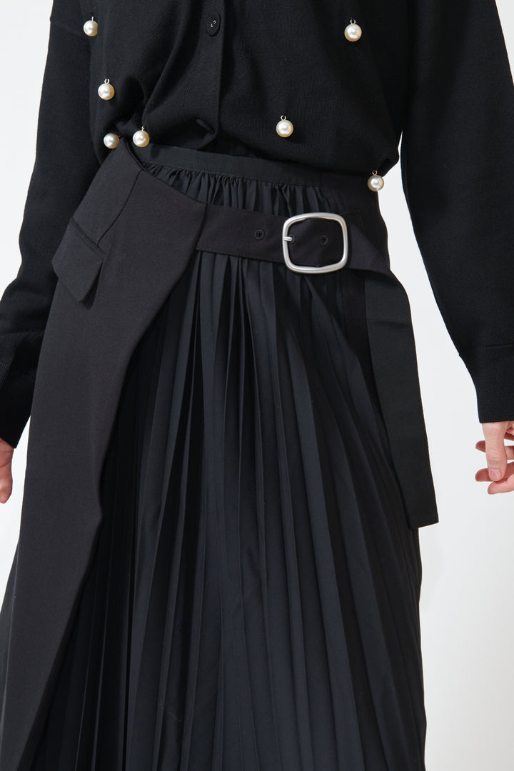 Madi wearing Buckled Flat And Pleated Wrap Skirt Black detail view